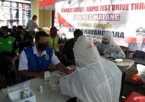 Polres Malang, Gelar Baksos Rapid Test Thru Covid-19 Terhadap Masyarakat dan Ojol