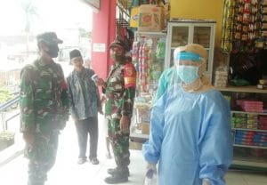 Koramil 0818/22 Tumpang Laksanakan Penegakan Disiplin New Normal di Pasar Tumpang