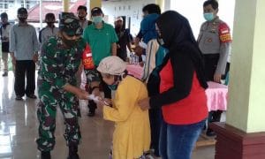 Danramil 0818/32 Wonosari bersama Forkopimcam Hadiri Pembagian BLT DD Tahap 2 Desa Bangelan