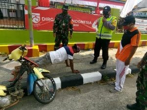 Tak Pakai Masker, Warga Pujon Dihukum Push Up