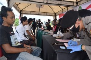 Tak Memakai Masker, Nyanyi Indonesia Raya