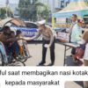 Sambut Hari Bhayangkara Lantas ke-69 Polisi Malang Kota Berbagikan Nasi Kotak