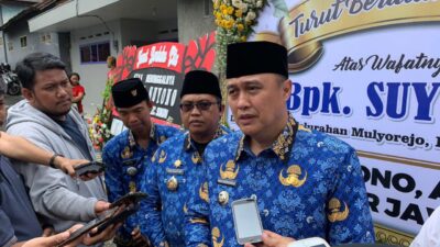 Ft: Dwi Andri Ningtyas istri almarhum Suyono Linmas TPS 04 Kelurahan Mulyorejo, Kecamatan Sukun.(MemoX/fat)