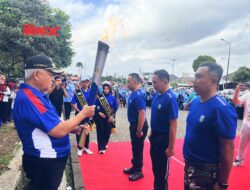 Acara Penyerahan Api Porprov IX dari Kabupaten Malang kepada Kota Batu di Rest Area Karangploso