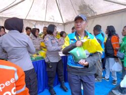 Ribuan Kilo Gram Beras dan Helm Dibagikan Polresta Malang Kota ke Driver Ojol