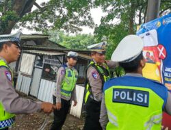 Ops Zebra Semeru 2025, Polres Malang Pasang Baliho Imbauan di Titik Rawan Kecelakaan
